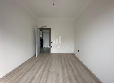 Свежая квартира в новостройке с чистовой отделкой без мебели в Махмутларе, Аланья ID-10623 фото-4
