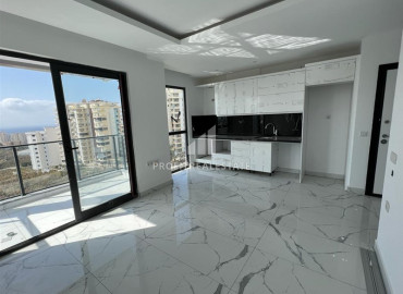 Квартира с одной спальней, 55м², с великолепным видом в новом элитном комплексе в Махмутларе, Аланья ID-12592 фото-2