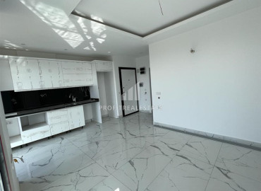Квартира с одной спальней, 55м², с великолепным видом в новом элитном комплексе в Махмутларе, Аланья ID-12592 фото-3
