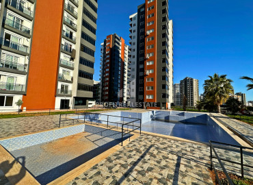 Трехкомнатные апартаменты, 115м², на высоком этаже в современной резиденции в районе Акдениз (Мезитли), Мерсин ID-12595 фото-1