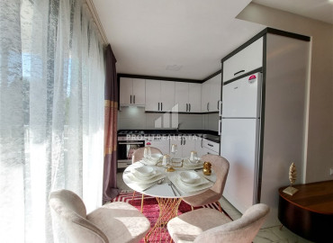 Недорогая уютная вилла 230 м2, с двумя спальнями и стильным интерьером, в 400 м от моря в Демирташе, Аланья ID-12640 фото-7