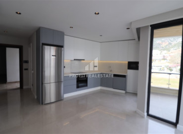 Двухкомнатная квартира, 52м², с чистовой отделкой в новом проект в центре Алании, у пляжа Клеопатры ID-12663 фото-3