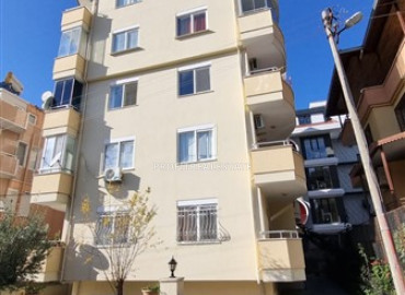 Просторная двухкомнатная квартира с двумя балконами в 650м от моря, в доме городского типа в районе Махмутлар ID-12666 фото-1