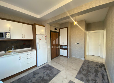 Меблированные апартаменты с двумя спальнями, 115м², с видом на море и горы в центре Мезитли, Мерсин ID-12684 фото-4