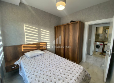 Меблированные апартаменты с двумя спальнями, 115м², с видом на море и горы в центре Мезитли, Мерсин ID-12684 фото-13