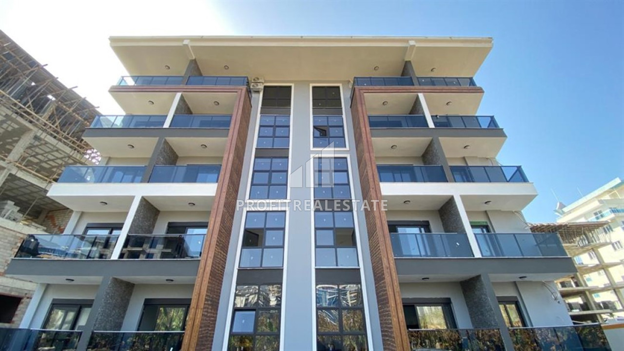 Новая двухкомнатная квартира в жилом комплексе 2022 года, Махмутлар, Аланья, 55 м2 ID-12692 фото-1