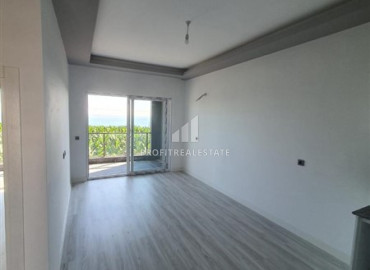 Двухкомнатная квартира в новостройке, без мебели, с видом на море, в 100 метрах от пляжа, в Окурджаларе, Аланья ID-12718 фото-3
