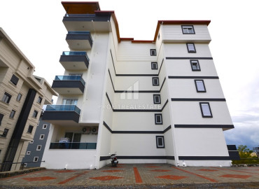 Бюджетная двухкомнатная квартира, 52м², в доме городского типа в 1750м от моря в районе Газипаша, Алания ID-12767 фото-3