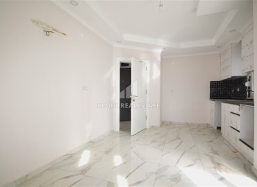 Бюджетная двухкомнатная квартира, 52м², в доме городского типа в 1750м от моря в районе Газипаша, Алания ID-12767 фото-9