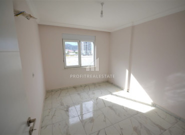 Бюджетная двухкомнатная квартира, 52м², в доме городского типа в 1750м от моря в районе Газипаша, Алания ID-12767 фото-12