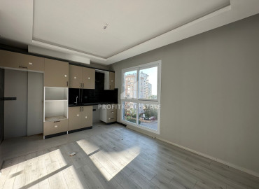 One-bedroom apartment, 50m², in a new small apartment residence in the Tomyuk area, Mersin ID-12786 фото-2