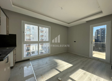 One-bedroom apartment, 50m², in a new small apartment residence in the Tomyuk area, Mersin ID-12786 фото-3