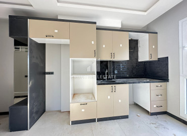 Апартаменты с одной спальней, 50м², в новом малоквартирном комплексе в районе Томюк, Мерсин ID-12786 фото-5