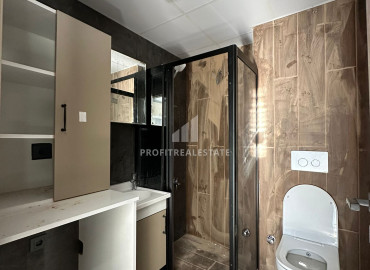 Апартаменты с одной спальней, 50м², в новом малоквартирном комплексе в районе Томюк, Мерсин ID-12786 фото-6