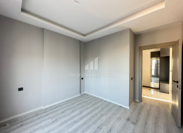 One-bedroom apartment, 50m², in a new small apartment residence in the Tomyuk area, Mersin ID-12786 фото-10