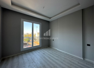 One-bedroom apartment, 50m², in a new small apartment residence in the Tomyuk area, Mersin ID-12786 фото-11