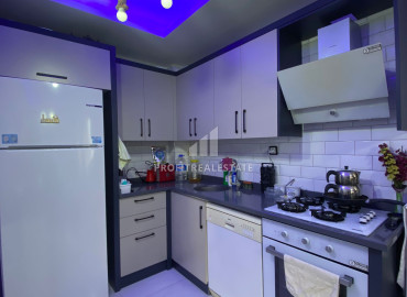 Компактная квартира 1+1, 55м² в новом газифицированном доме городского типа, в 500м от моря в Тедже, Мерсин ID-12790 фото-3