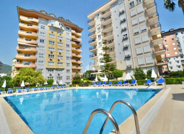 Two bedroom furnished apartment 110 m2 with sea view, in a residence with a swimming pool in the center of Alanya ID-11139 фото-1