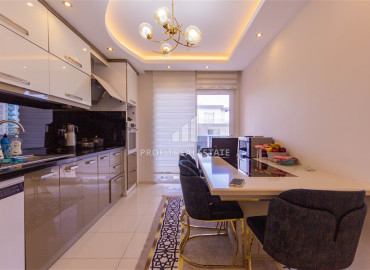 Design three bedroom apartment 130 m2, with a separate kitchen, 300 meters from the sea in Mahmutlar, Alanya ID-12820 фото-13