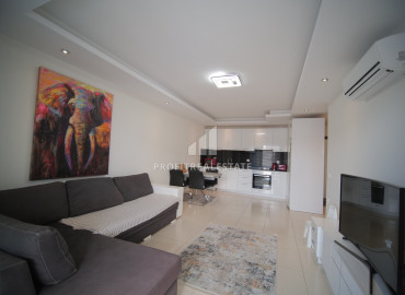 Spacious furnished one-bedroom apartment, 70m², in a premium class residence in Oba, Alanya ID-12610 фото-2