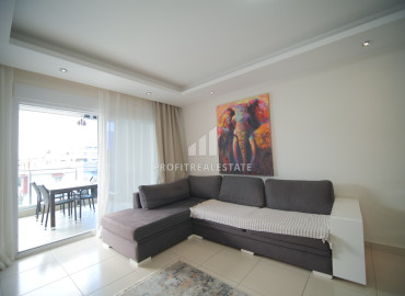 Spacious furnished one-bedroom apartment, 70m², in a premium class residence in Oba, Alanya ID-12610 фото-6