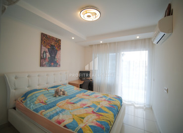 Spacious furnished one-bedroom apartment, 70m², in a premium class residence in Oba, Alanya ID-12610 фото-10