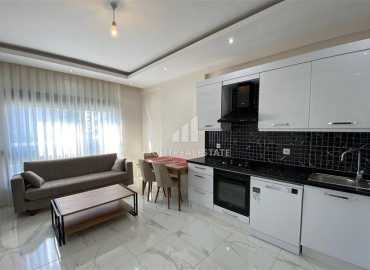Симпатичная меблированная двухкомнатная квартира, 56м², в новом комплексе в 200м от моря в районе Кестель ID-12835 фото-2
