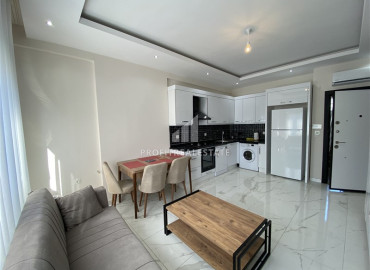 Симпатичная меблированная двухкомнатная квартира, 56м², в новом комплексе в 200м от моря в районе Кестель ID-12835 фото-4