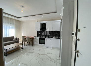 Симпатичная меблированная двухкомнатная квартира, 56м², в новом комплексе в 200м от моря в районе Кестель ID-12835 фото-5