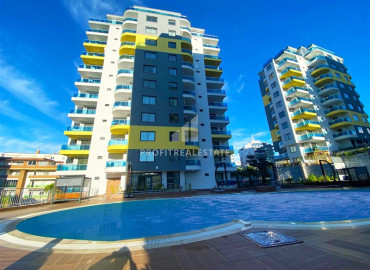 One-bedroom apartment, 52m², on the high floor of an elite new building in Mahmutlar, 500m from the sea, Alanya ID-12838 фото-2