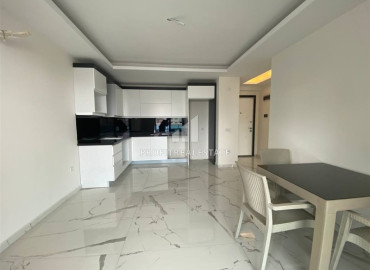 One-bedroom apartment, 52m², on the high floor of an elite new building in Mahmutlar, 500m from the sea, Alanya ID-12838 фото-5