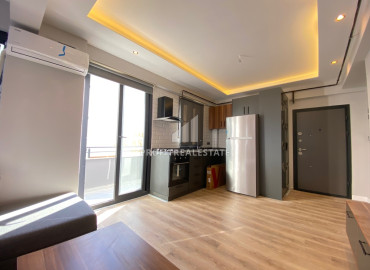 Меблированная квартира с одной спальней, 55м², в газифицированном комплексе в районе Мезитли, Мерсин ID-12849 фото-4