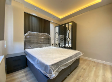 Меблированная квартира с одной спальней, 55м², в газифицированном комплексе в районе Мезитли, Мерсин ID-12849 фото-10