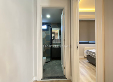 Меблированная квартира с одной спальней, 55м², в газифицированном комплексе в районе Мезитли, Мерсин ID-12849 фото-13