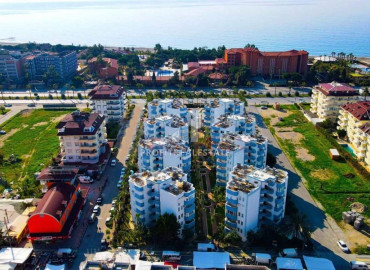 Недорогие трехкомнатные апартаменты с мебелью, в 300 метрах от пляжа в Конаклы, Алания ID-12865 фото-15