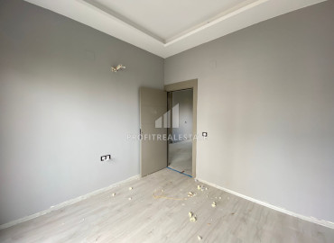 Двухкомнатная квартира, 65м², на высоком этаже в 400м от моря в Эрдемли, Арпачбахшиш ID-12870 фото-11