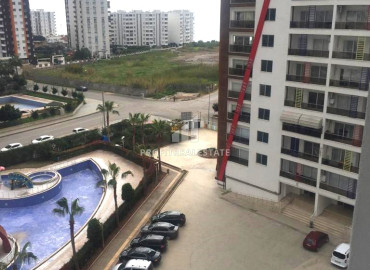 Furnished two-bedroom apartment, 110m², in a residence with good facilities, in Tej, Mersin ID-12884 фото-2