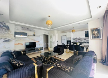 Дизайнерские трёхкомнатные апартаменты 125 м2, с роскошным авторским интерьером, в 150 метрах от моря в Махмутларе, Аланья ID-12893 фото-1