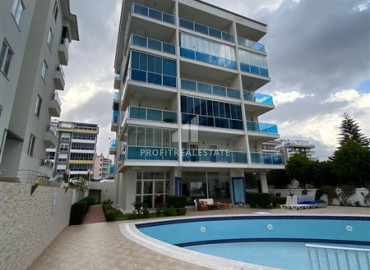 Светлые двухкомнатные меблированные апартаменты 65м2, с видом на море, в 100 метрах от пляжа в Кестеле, Аланья ID-12896 фото-2