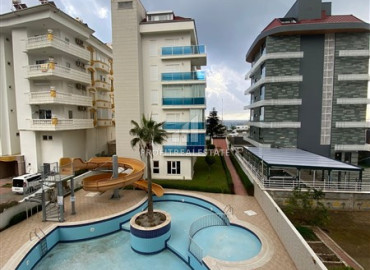 Bright one bedroom furnished apartment 65m2, with sea views, 100 meters from the beach in Kestel, Alanya ID-12896 фото-18