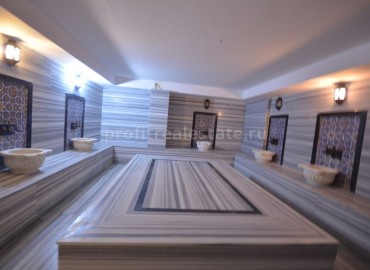 Квартира планировки 1+1 с частичным видом на море, полным пакетом мебели в современном комплексе с отличной локацией в Махмутларе, Алания, 65 кв.м. ID-0996 фото-4