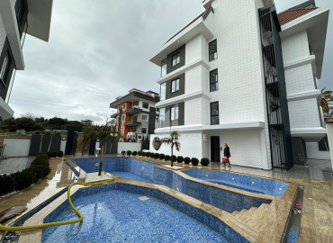 Двухкомнатные апартаменты с дизайнерским интерьером в резиденции 2022 года строительства Махмутлар, Аланья 47 м2 ID-12921 фото-10