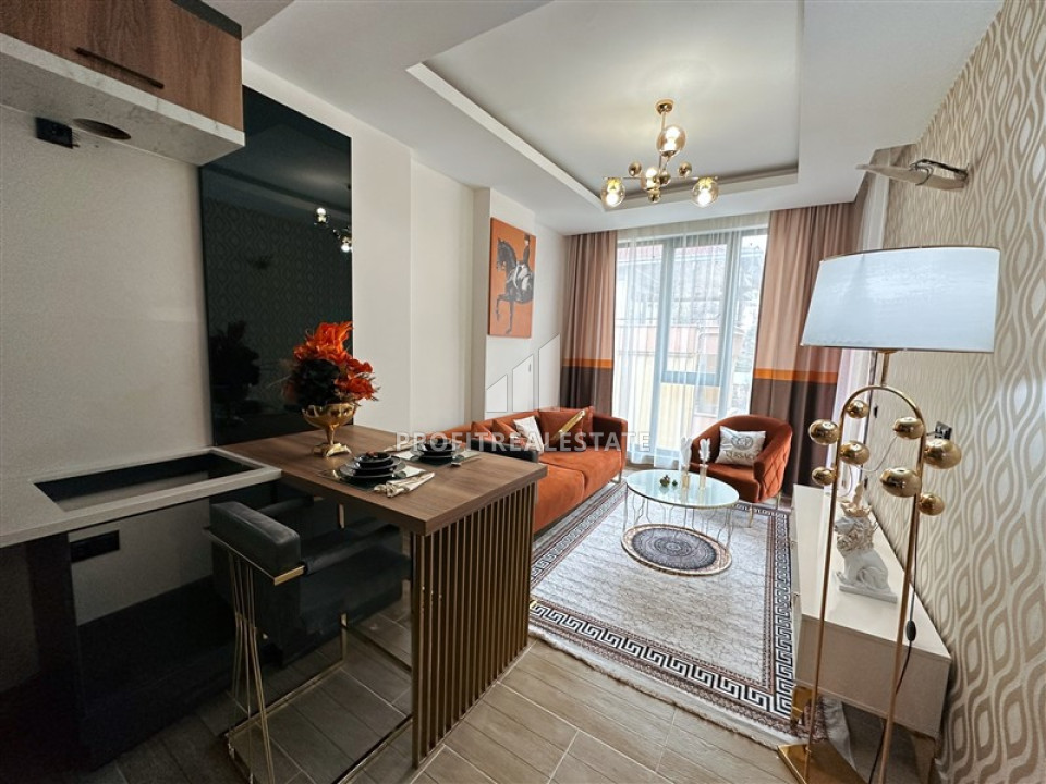Двухкомнатные апартаменты с дизайнерским интерьером в резиденции 2022 года строительства Махмутлар, Аланья 47 м2 ID-12921 фото-1