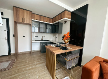 Двухкомнатные апартаменты с дизайнерским интерьером в резиденции 2022 года строительства Махмутлар, Аланья 47 м2 ID-12921 фото-4
