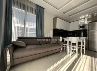 Стильная квартира с одной спальней, 45м², в новой резиденции с инфраструктурой в районе Оба, Аланья ID-12925 фото-1