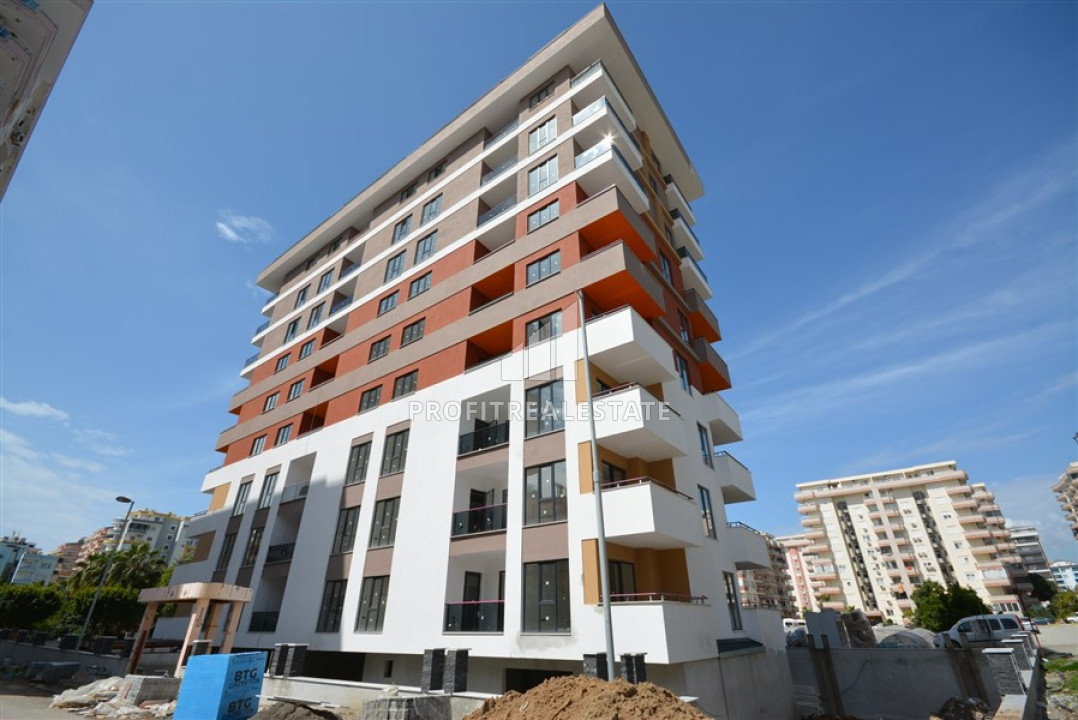 Апартаменты 1+1, 60м², в комплексе премиум класса на этапе ввода в эксплуатацию, в Махмутларе, Алания ID-12926 фото-1