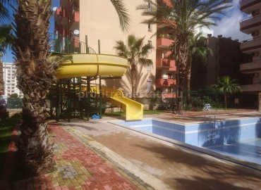 Квартира планировки 3+1 в комплексе с бассейном в центральной части района Алании Махмутлар ID-0999 фото-2