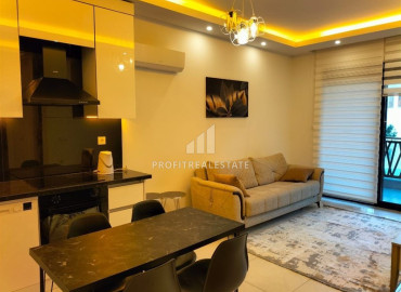 Furnished one-bedroom apartment 58m2, in a residence with developed facilities in Mahmutlar, Alanya ID-12957 фото-3