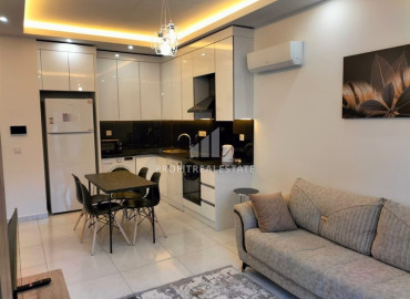 Furnished one-bedroom apartment 58m2, in a residence with developed facilities in Mahmutlar, Alanya ID-12957 фото-5