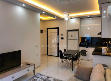 Furnished one-bedroom apartment 58m2, in a residence with developed facilities in Mahmutlar, Alanya ID-12957 фото-14